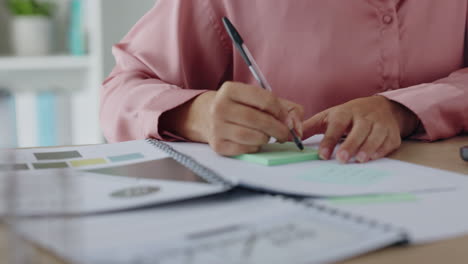 woman taking notes