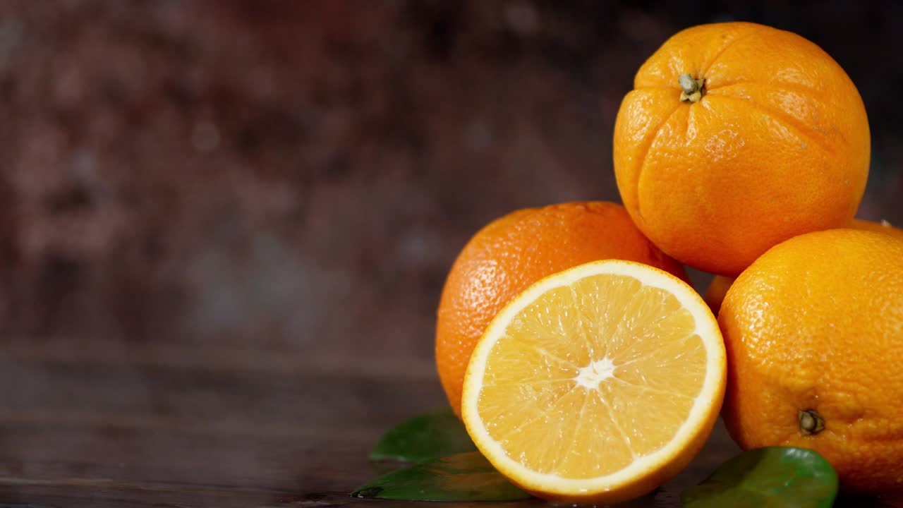 Half and whole oranges with cool steam.