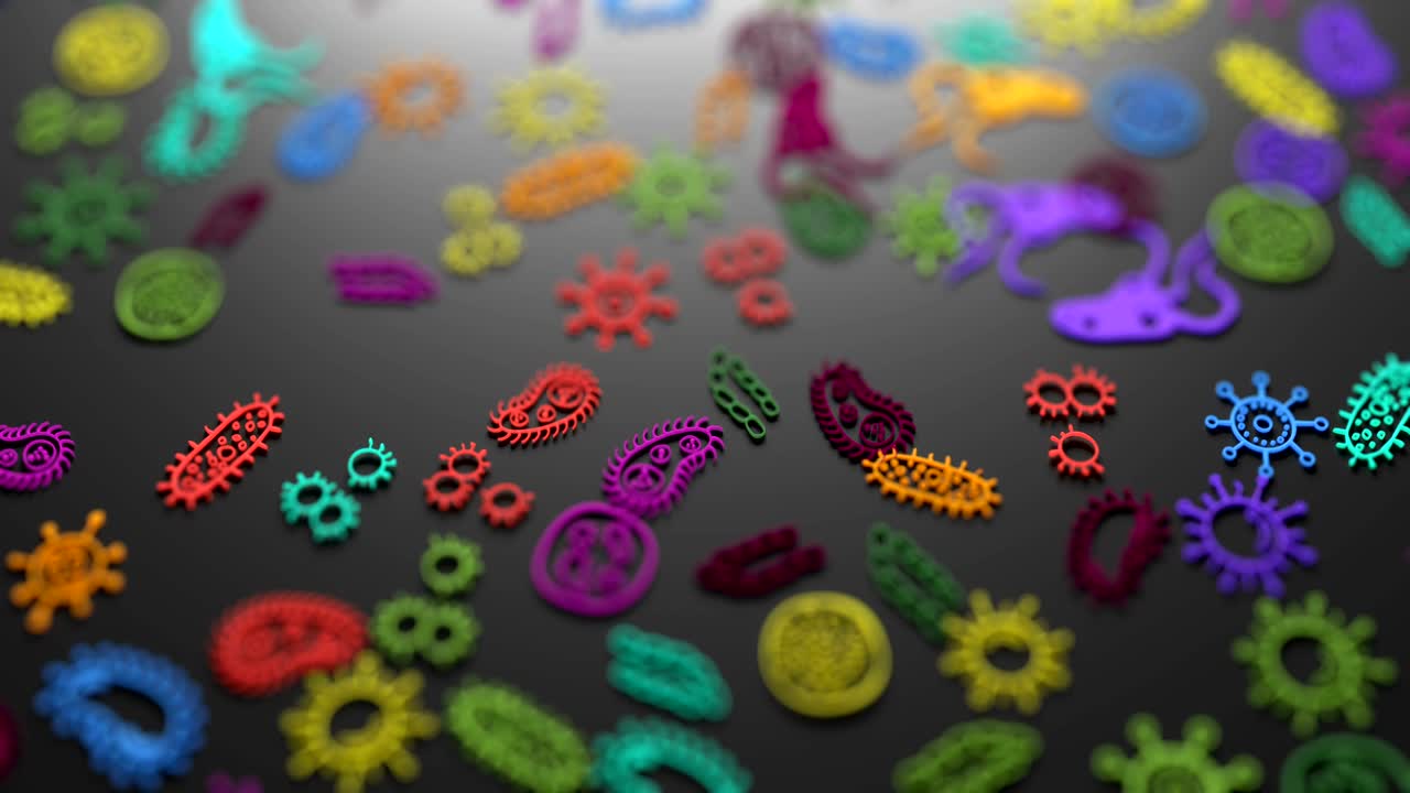 símbolos coloridos de bacterias, virus y gérmenes en la vista macro.