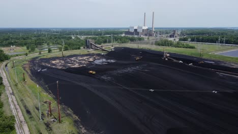 Enormous-landfill-of-coal-at-DTE-Belle-River-Power-Plant,-in-East-China,-Michigan,-USA