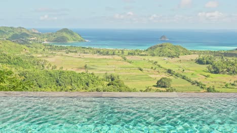 calming water of infinity pool on the edge of southern lombok mountains