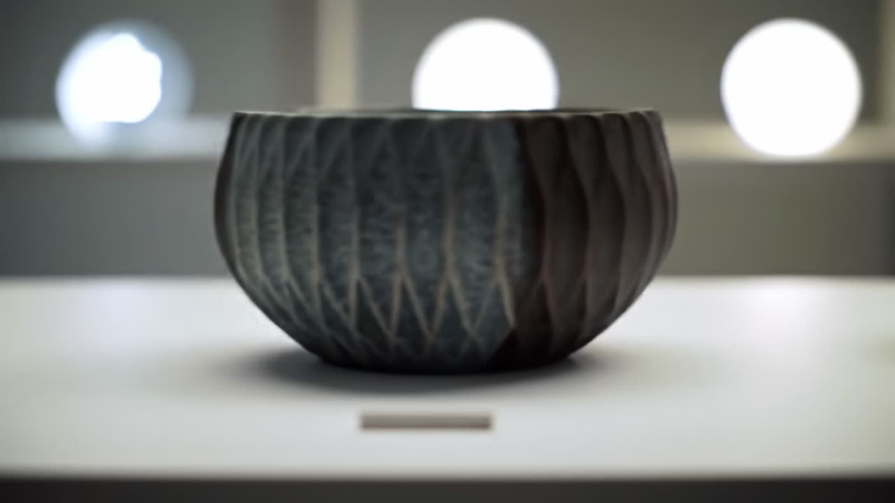Exploring Artistic Ceramics: A Journey Through Two Stunning Pieces Showcasing Unique Designs and Textures in Contemporary Craftsmanship