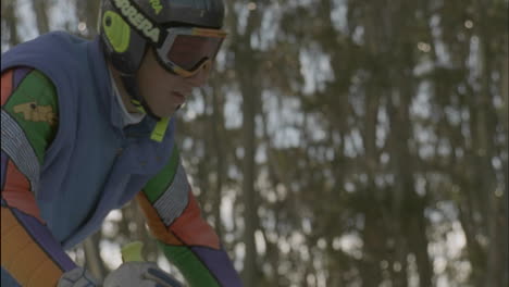 a skier prepares to ski down a slope