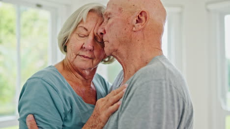 dance, kiss and senior couple hug in their home