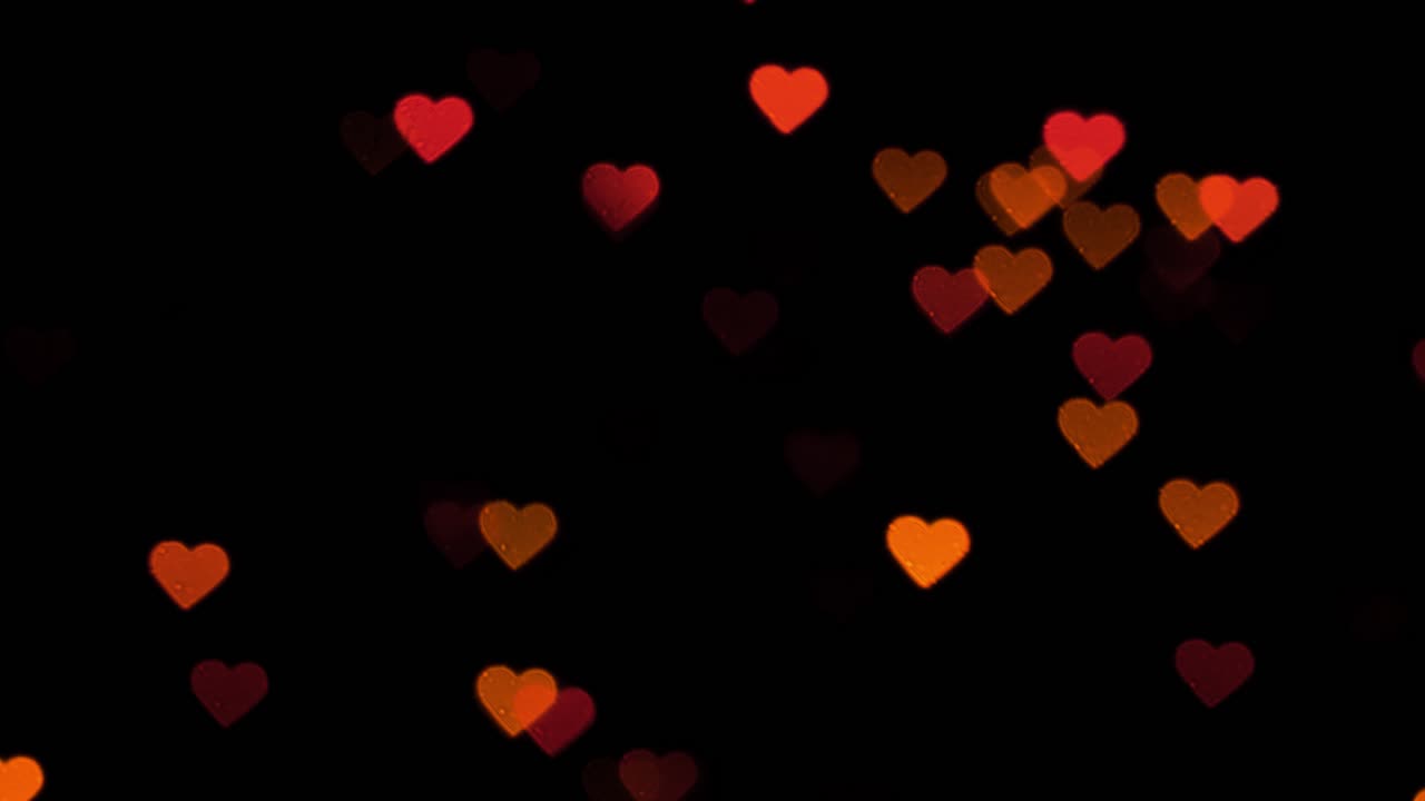 bokeh de hermosos corazones de luces intermitentes, día de san valentín, día de la boda o medios sociales como concepto de fondo