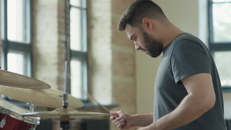professional drummer using drum set