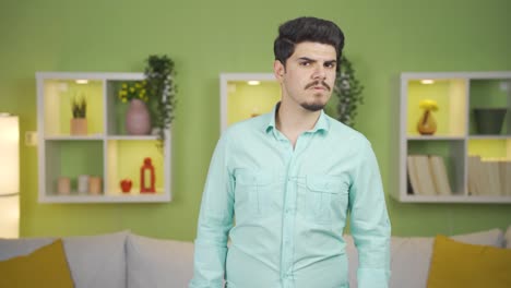 Portrait-of-man-looking-curiously-at-camera.-Listening-to-news-and-announcements.