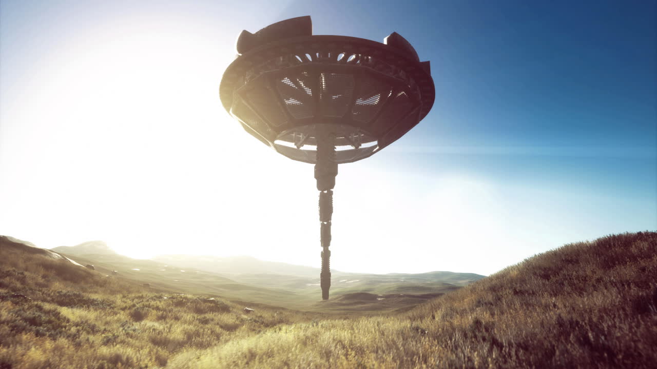 Mysterious alien ship hovers over an open field during a bright sunrise
