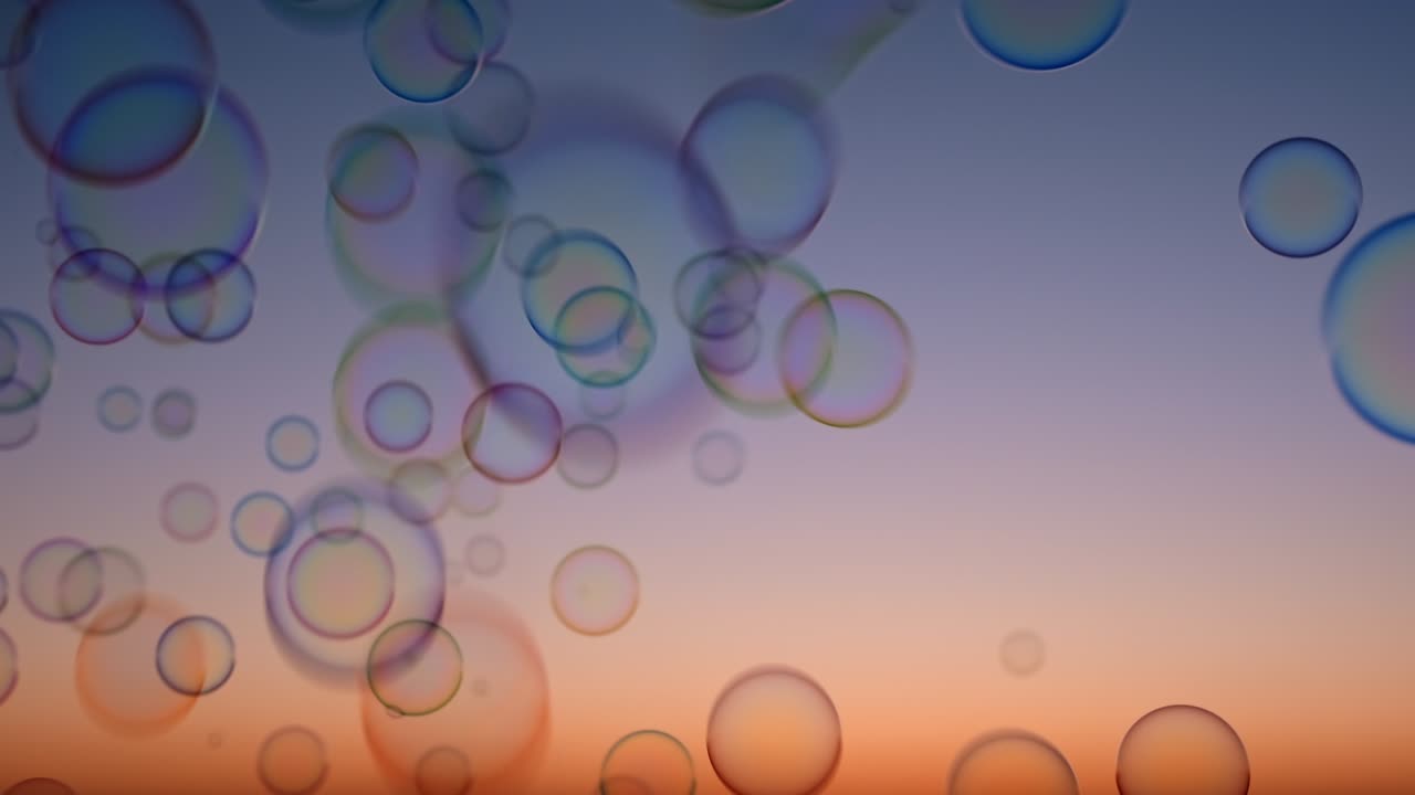 Soap bubbles on sky at sunset summer slow motion. Bright background multicolored bubbles smoothly fly in sky. Childhood, Freedom. Dreams. Relax. Happiness