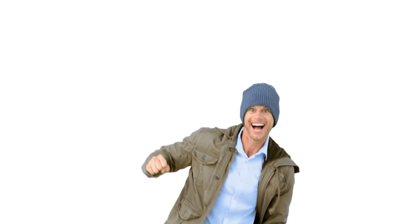 Man jumping and turning on white background