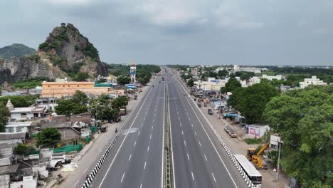 drone footage of vijayawada, where the mix of urban infrastructure and surrounding greenery makes for a stunning view.