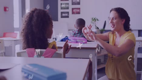 Animation-of-letters-floating-over-happy-diverse-female-teacher-and-schoolgirl-signing-in-class