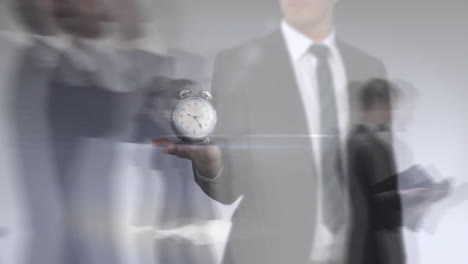 animation of ticking alarm clock over businesspeople in fast motion