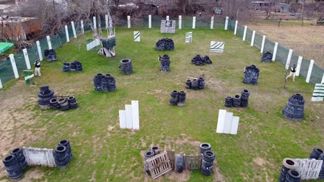 drone shot of paintball soldiers starting a game round