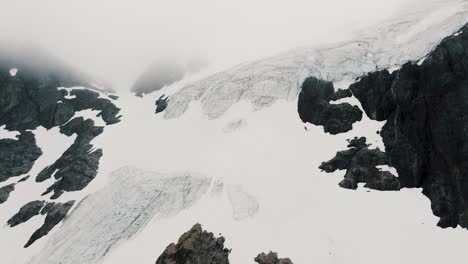 sprawling glacier at the rock mountains in glaciar vinciguerra, ushuaia, tierra del fuego, argentina