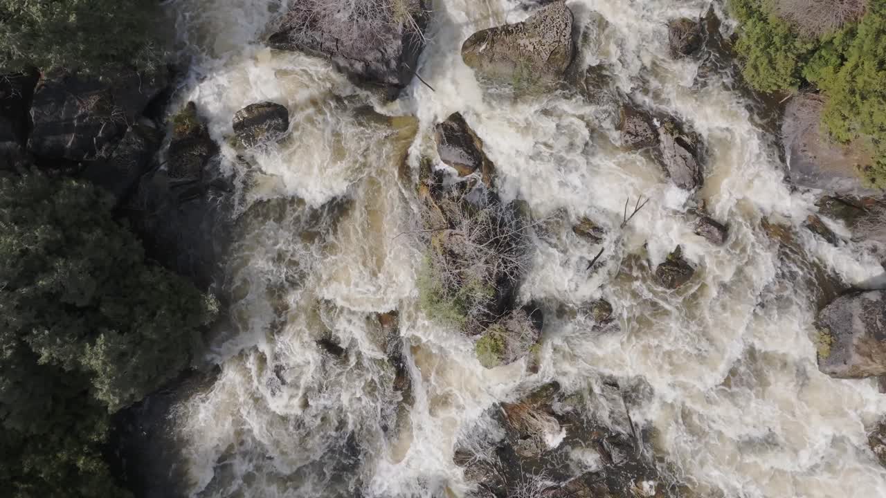 Rapid flowing water over rocks in owen sound, canada, aerial view
