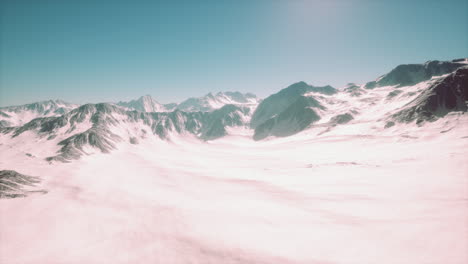 panoramic mountain view of snow capped peaks and glaciers