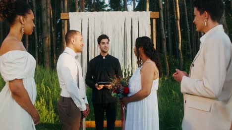 interracial couple's forest wedding ceremony