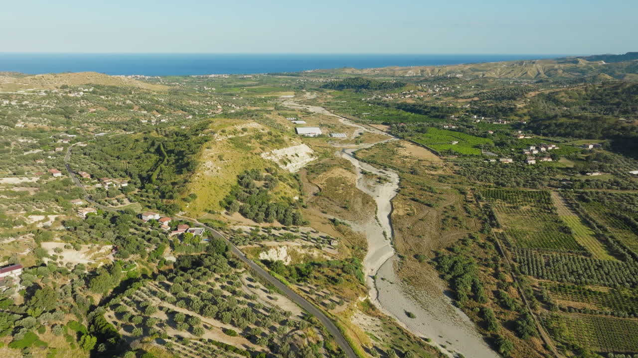 A Dry River In Calabria Flows Towards The Mediterranean Sea Due To Drought