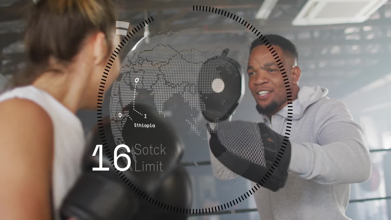 Trainer holding mitts, boxer hitting pads while HUD values rising then falling for boxing training