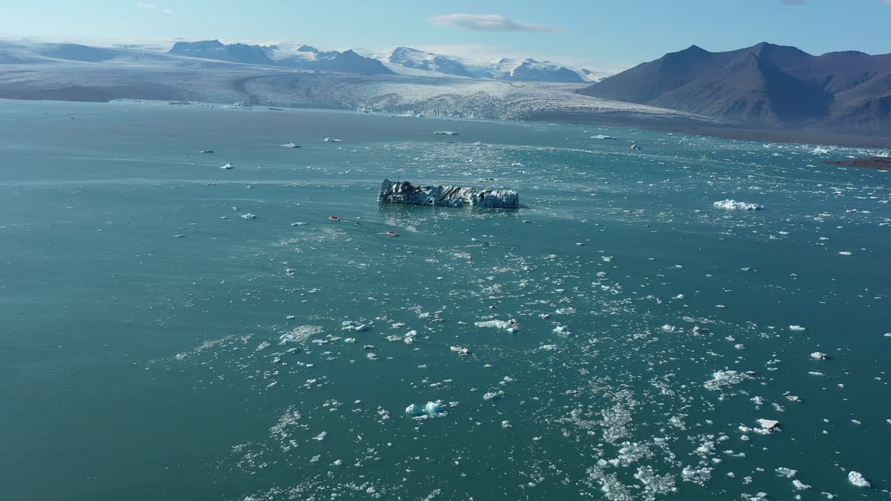 Aerial View of Icebergs and Boats in Jökulsárlón Glacier Lagoon, Iceland