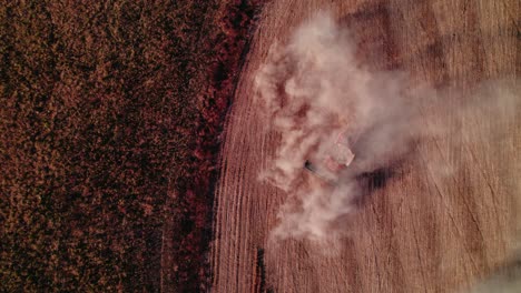 aerial dust trail from harvester, non gmo soy harvest, hawkinsville georgia