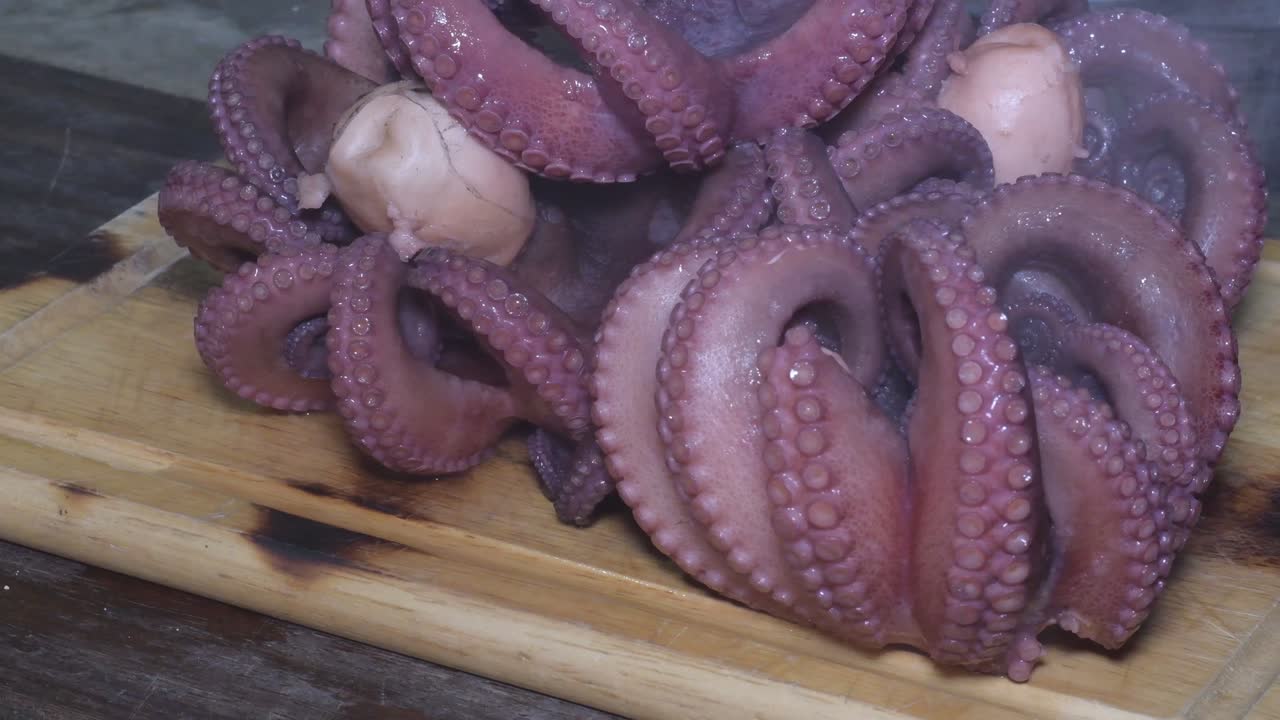 Hot Cooked Octopus Freshly Prepared on a wooden table ready to prepare a healthy and gourmet seafood