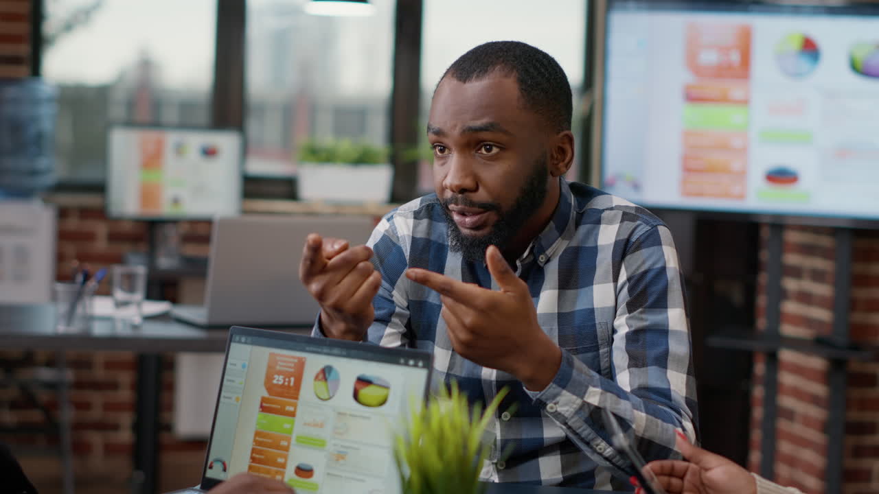 African american worker attending business meeting in office