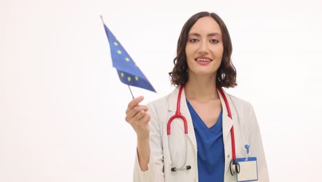 female doctor holding european union flag