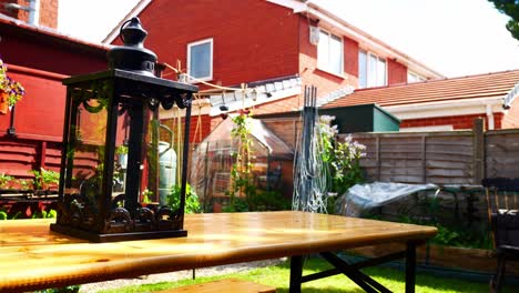 ornamental gothic black metallic lantern on home garden table furniture