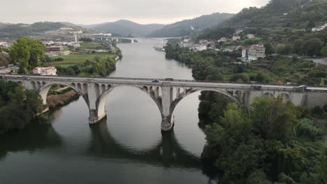 ponte de pedra bridge over douro river at entre os rios town in portugal