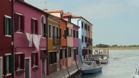 medium shot of colorful houses at burano, venice