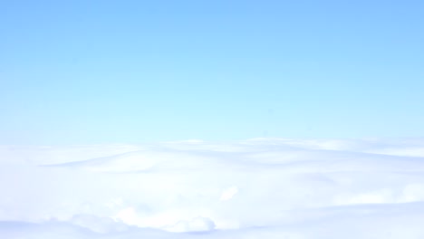 clouds in the sky. view of clouds through airplane window.