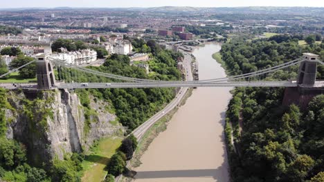 aerial over river avon with view of clifton suspension bridge on sunny day