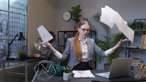 angry businesswoman in office