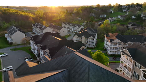 colorful sunset over residential apartment building units in usa