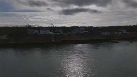 An-aerial-view-of-the-calm-waters-of-the-Long-Island-Sound-off-Long-Island,-NY-on-a-cloudy-day