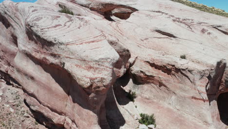 Aerial---Puente-del-Diablo-rock-formations,-Argentina,-wide-circle-shot