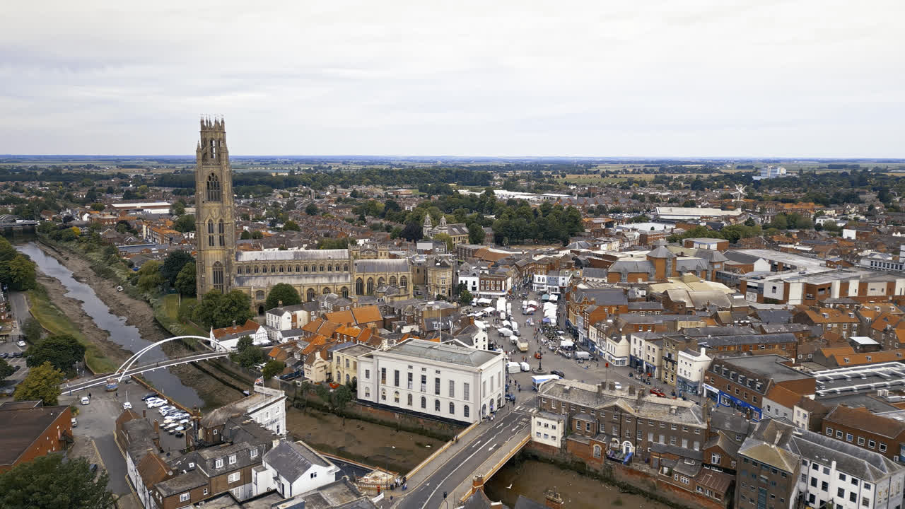 scenic beauty of Boston, Lincolnshire, in mesmerizing aerial drone footage: Port, ships, Saint Botolph Church , Saint Botolph's Bridge