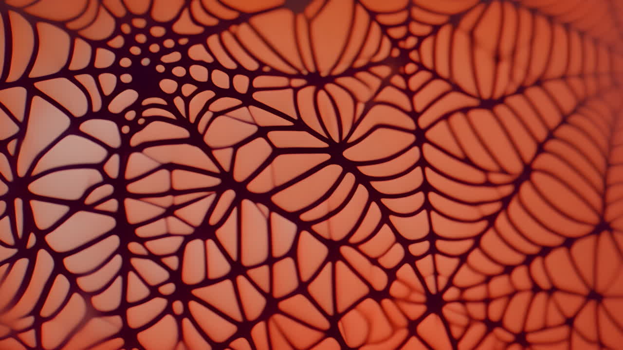 Abstract geometric patterns animation over orange gradient background
