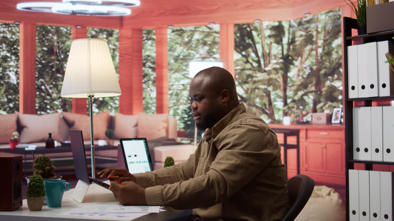 Successful freelancer does online shopping with his credit card