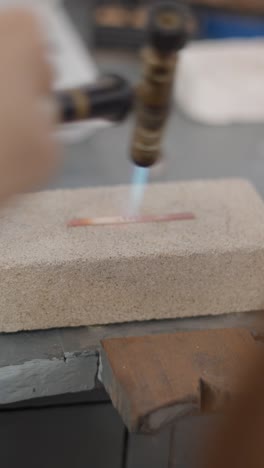 metalworking process: heating metal with a torch