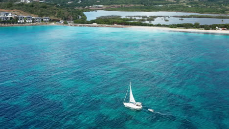 drone footage of sailboat in antigua