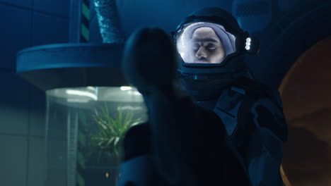 astronaut preparation in futuristic space facility
