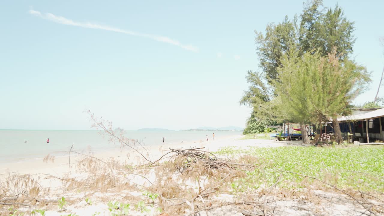 Lok Kawi Beach The Beach Sits Near Residentail Zone,With Its Shoreline Sea,Beds,Good For Casual Beach Time,During Sunset,With White Sandy Beach,Blue Sea Facing Few Island To The South China Sea