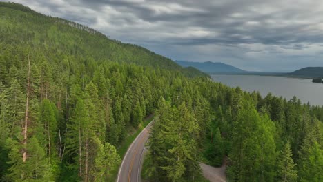 Mountain-Highway-Through-Coniferous-Trees-Near-Swan-Valley-In-Montana,-USA