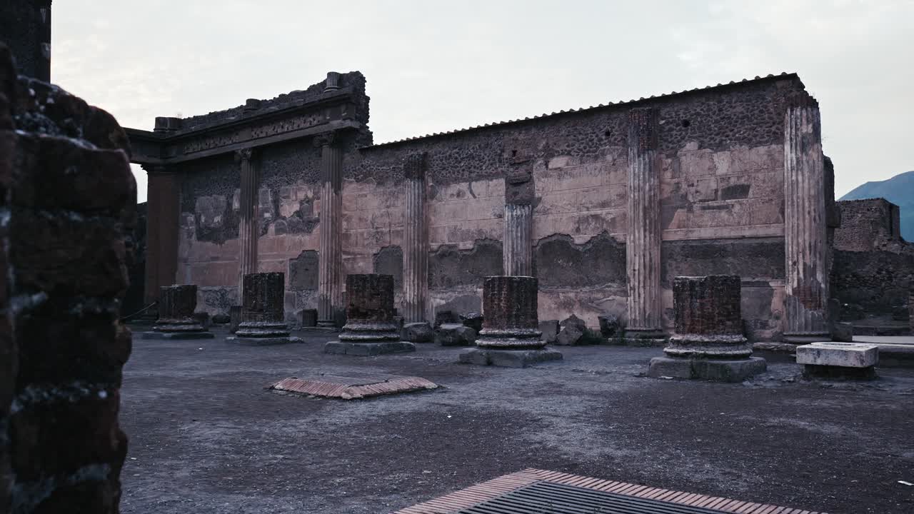 Dusk settling on Pompeii's Basilica ruins, Italy