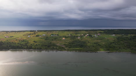 Side-moving-aerial-view-of-Notre-Dame-de-l'Isle-Verte,-Québec-Canada