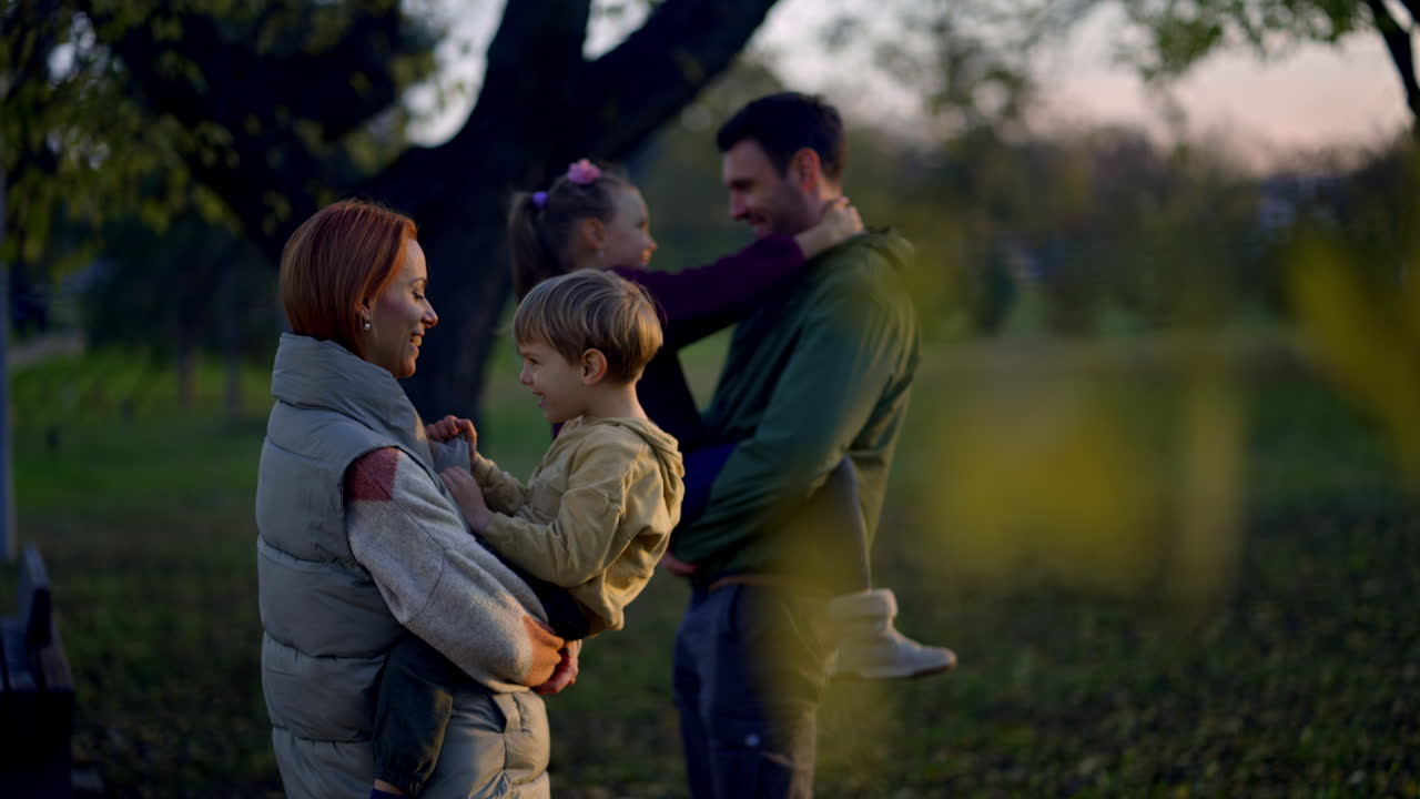 A loving family spending time together in a park