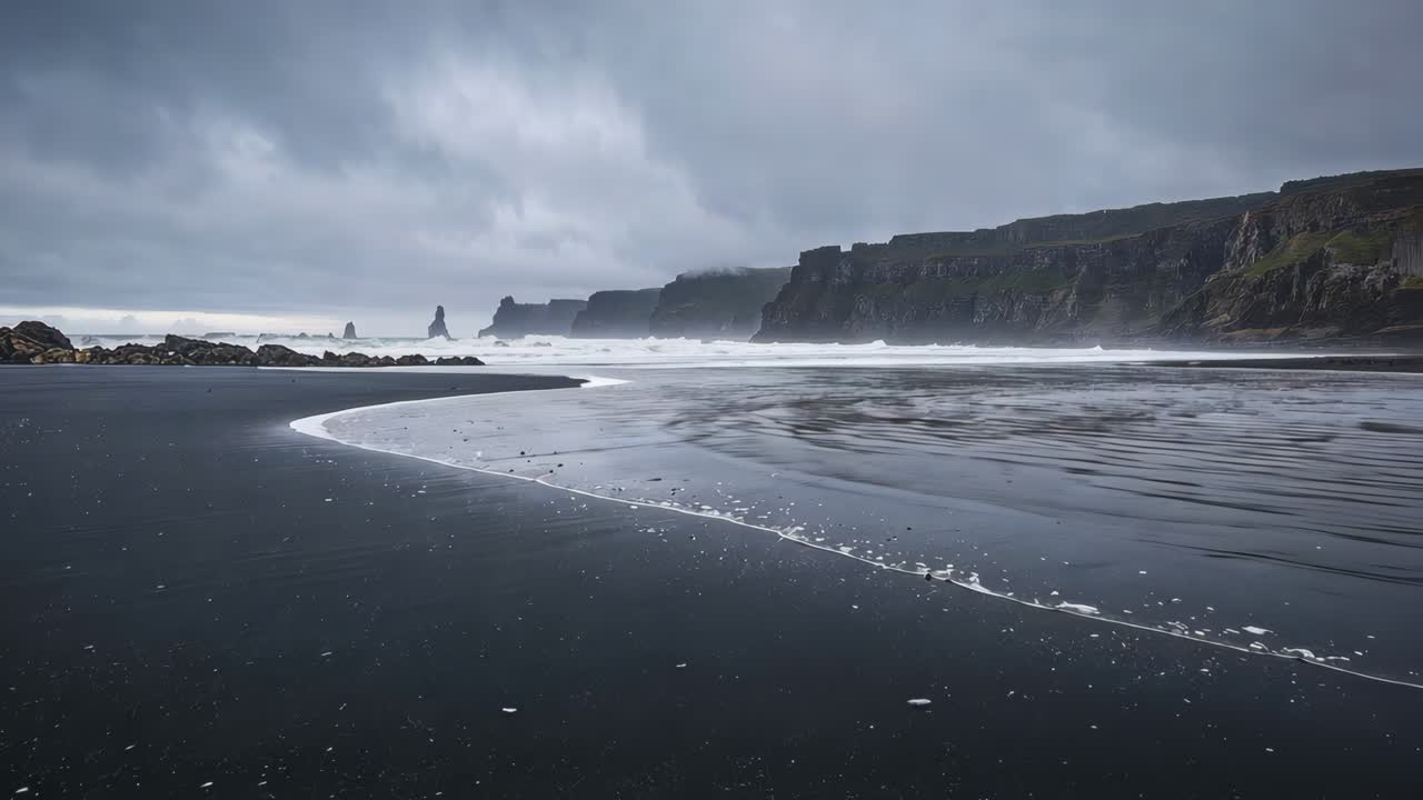 Dramatic Black Sand Beach with Sea Stacks and Cliffs